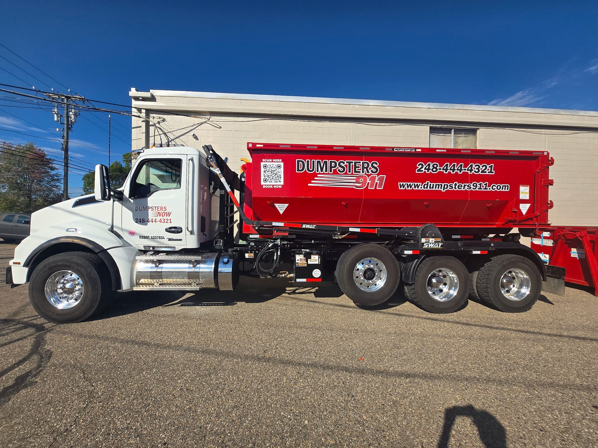 Dumpster delivery truck in Michigan