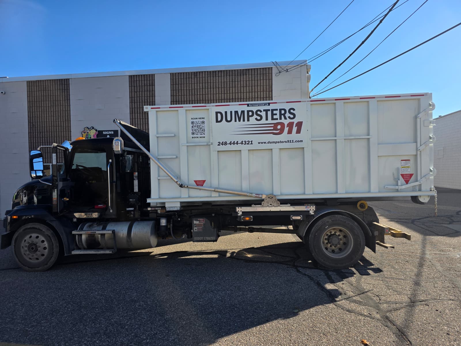 Junk Removal Dumpster Delivery Truck